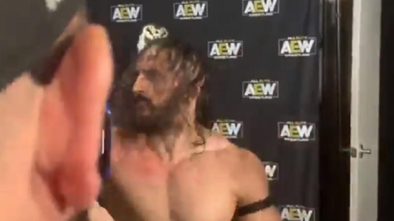 PAC Confronts, Throws Bottle At "Hangman" Adam Page After AEW All Out (Video)
